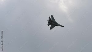 Military fighters performing aerobatic maneuvers. Airplane army. Airplane spinning in the air, extreme flight