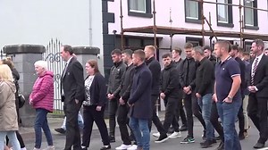 Boyzone star Ronan Keating carries coffin of older brother Ciaran to funeral