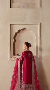 Shabana | SKU: AS-V3-24-09 Unstitched: 15,900 PKR | Stitched: 25,400 PKR This exquisite ensemble is crafted from luxurious dark pink raw silk, exuding richness and elegance. The ensemble is paired with a sheer organza dupatta, beautifully detailed with a four-sided embroidered border. The trouser features intricate embroidery, adding a striking focal point to the design. Perfect for festive gatherings and special occasions, this outfit combines timeless charm with refined sophistication. Divani 