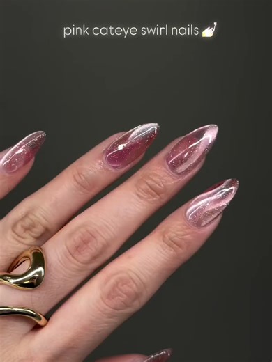 How to: Deep pink cateye swirl tutorial 🌀💗 Video by: @gelsbydiana Recreate using: From the Nail - Rosecore Collection Available at www.sweetienailsupply.com #gelnails #koreannails #naildesign #pinkcateye #cateyenailtutorial