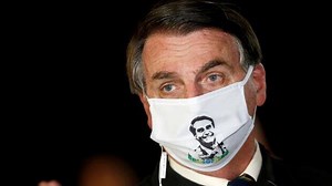 Bolsonaro, 65, confirmed the test results while wearing a mask and speaking to reporters in the capital Brasilia. The president has been downplaying the severity of the virus for months. His response to the coronavirus has been highly criticized. | CBC News