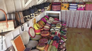 Various handmade souvenir goods, mostly baskets and bags on display at local market in Antananarivo, Madagascar