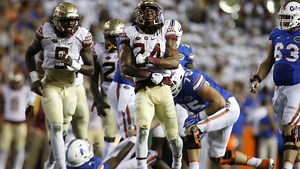 Maguire's gutsy TD, FSU's defense fuel 27-2 victory over Florida