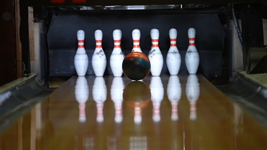 Watch what happens when a bowling ball hooks perfectly