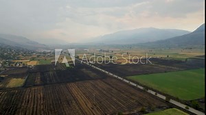Natural disaster of farming fields consumed by wildfire that destroyed the crops