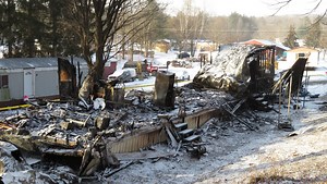Two dead in fire at Newfield trailer home