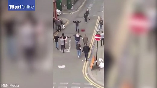 Man United and Man City fans brawl in city centre after Derby