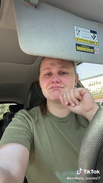 Inside a Vehicle: Driver's Perspective with Dunkin' Background