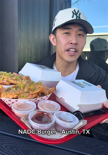 Rating a burger at NADC Burger in Austin, TX #austinfood #burgerlover #burgertok #austinfoodie #foodreviews