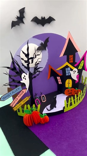 CraftISH corner on Instagram: "👻✨ Step into Ghost Alley! This spooky haunted house is made entirely out of paper—yes, every pumpkin, bat, and ghost! 🦇🎃 Create your own mini Halloween scene with bright colors and fun details. Perfect for decorating your desk or adding some handmade magic to your spooky setup! 💀🕸️ Would you dare visit this haunted house? Find the link in bio for all the craft supplies! ✂️🧡 #PaperCraft #HalloweenDIY #HauntedHouseCraft #SpookySeason #CraftIdeas #HalloweenDecor