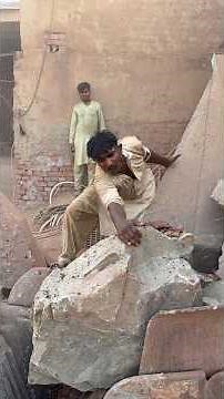 One-Handed Worker Lifts Massive Rock Into Hammer Crusher 💪🪨