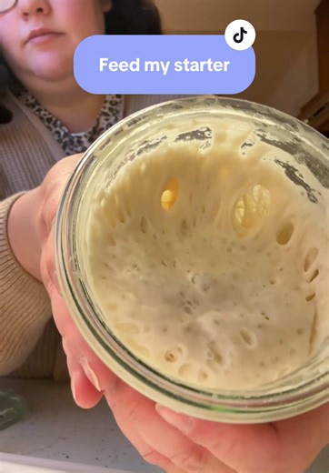 Feed my sourdough starter with me and transfer her to a new jar. I really just eyeball everything now and she’s thriving! #starter #webbing #sourdoughstarter #homemade #sourdough