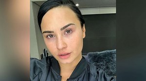 Demi Lovato shows off barefaced selfie: 'proud of my freckles, proud of my booty chin...'