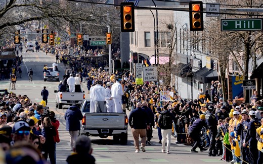 Thousands turn to honor Michigan basketball championship with parade