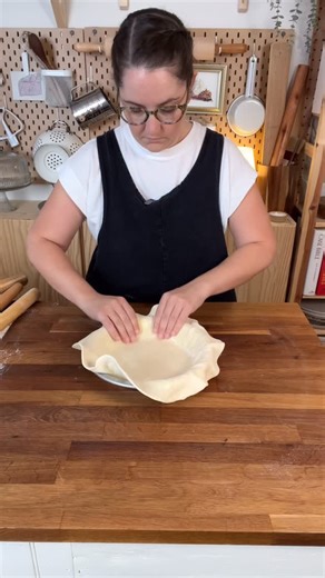 Kelli Avila - Everyday Pie on Instagram: "You’ve successfully rolled out your pie crust: now what? A few tips for assembling your pie: If it’s getting too warm, place it in the refrigerator to chill so the butter doesn’t get too soft. After placing the dough in the pie tin, gently guide it down the sides and into the bottom inner edges. Press the dough downward so it settles into the shape of the tin rather than stretching over it. You want the dough supported, not pulled. This helps it stay in 