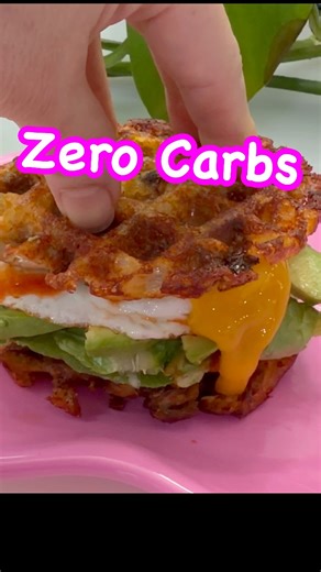These zero-carb chicken waffles are crispy, cheesy, and made with just cooked chicken and mozzarella—no flour, no sugar, no guilt. Topped with avocado, bacon, lettuce, and egg, they’re perfect for keto, low-carb, or carnivore lifestyles. #ZeroCarb #KetoRecipes #LowCarbMeals #HighProtein #KetoBreakfast | Fusion Food Adventures