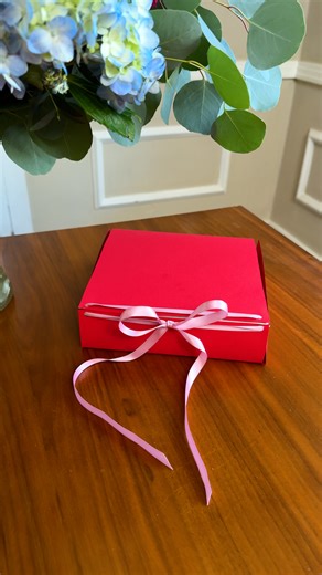 Jeff & Lauren on Instagram: "Handmade Gift box! ❤️ Easy technique to make custom gift boxes with large craft papers and ribbon! #giftbox #papercrafting #crafts #gifting"