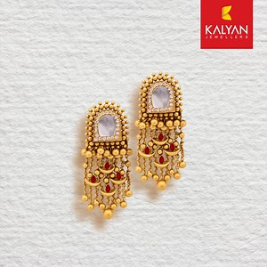 16 reactions | Channelling the graceful essence of air into every gleaming detail of our lightweight bridal collection, Kalyan Jewellers brings you these stunning gold danglers…Light as a feather, yet brimming with timeless allure! #KalyanJewellers #Muhurat #InMyElement | Kalyan Jewellers Middle East | Facebook