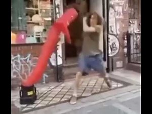 Guy fights inflatable tube man 👊🏻