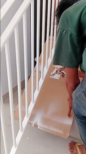 white paint for stair railings using compressor spray paint.