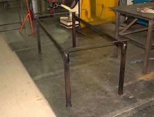 Patio table, steel structure with wooden table top