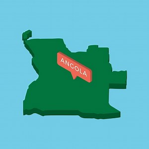 green isometric map of african country angola with orange pointer on...