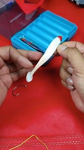 A small adjustment can change how your soft lure moves in the water. This is the simple way I rig mine to get better action and cleaner hook-ups. #SoftLure #LureRigging #FishingTips #FishingReels #AnglerLife | Fishing Knots Tutorial