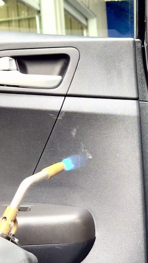 Repairing Scratches on Car Door Panel with Torch