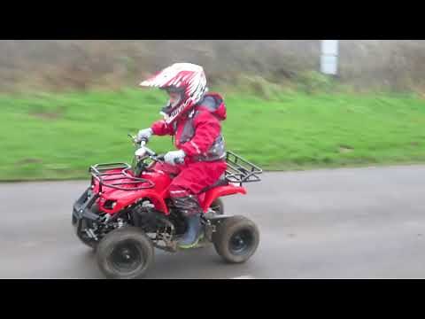 Kids play on ride on Quad Bikes fast top speed