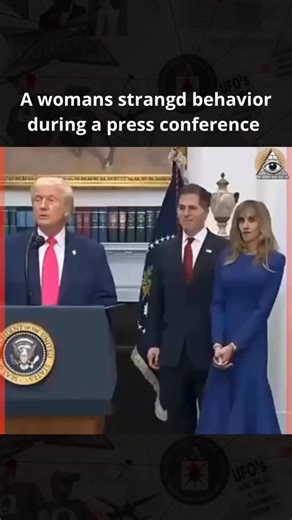 @unknowncases__ on Instagram: "💀 A Woman’s Strange Behavior During a Press Conference 👁️🎙️ At first, everything seemed normal. Then her eyes drifted, her smile froze, and her movements stopped matching her words. Long pauses. Repeated phrases. A glance off-camera like she was waiting for permission. They called it “stress”… but stress doesn’t look programmed. 📖 Comment BOOK and I’ll show you why moments like this keep happening in front of cameras — and what’s really going on when the script