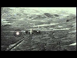 B-25 Mitchell aircraft fly in a formation over the Caroline Islands in the Pacifi...HD Stock Footage