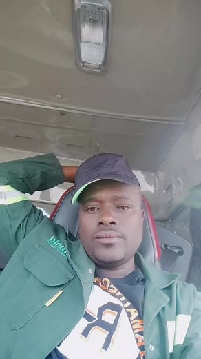 Inside Look: Person in Reflective Jacket and Black Cap