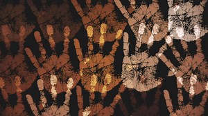 Download Abstract pattern background with a collection of handprints of various skin colorings and tones. This diversity and inclusion concept motion background animation is 4K and a seamless loop. for free
