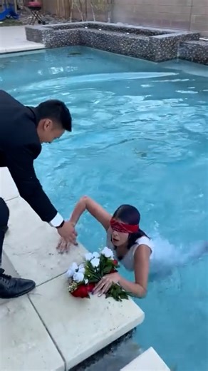 Bride does a trust fall with the groom who pranks her This post was created by Jason J. | It Is A Weird World