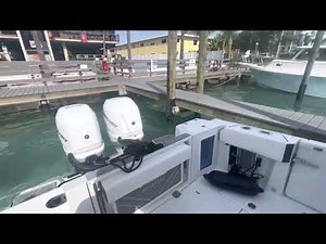How to dock a twin outboard boat in a slip with heavy tide. Blackfin 332.