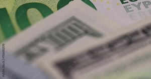 cash one hundred euros and 100 dollars close-up, genuine cash from the European Union and the USA