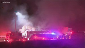 One killed in Friday's fiery I-285 crash involving tractor-trailer