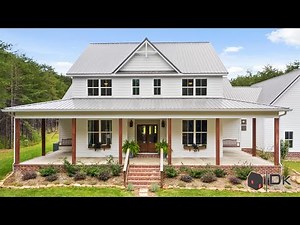 Absolutely stunning modern farmhouse home wrap-around front porch and large garden space