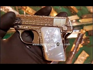 Colt 1908 Vest pocket fully engraved, nickel plated with genuine mother of pearl grips.