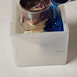 This was kind of a weird but totally awesome project. My nephew loves fishing so I thought I would make him an awesome fish pyramid resin light and here's a tutorial on it for anyone interested. You can leave the fish out or substitute something of your choosing :) PS: No, these fish aren't real.... | Mixed Media Girl