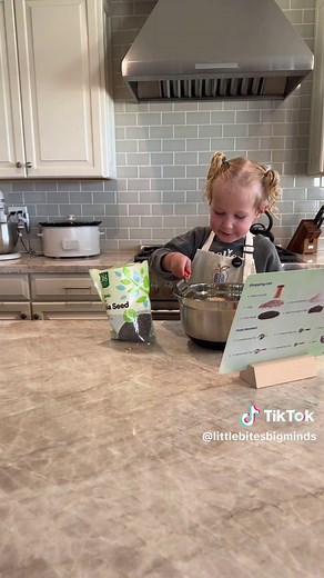 She’s three — and yes, she really made these. When kids are given the right tools and clear, visual steps, they’re capable of so much more than we expect. Cooking builds independence, coordination, confidence, and real life skills — all before they can even read. These picture-based recipes are designed for little hands, developing minds, and families who want learning to feel natural (and fun). 🥄📖 This is exactly why Little Bites, Big Minds exists. #ToddlerCooking #KidsCanCook #MontessoriAtHo
