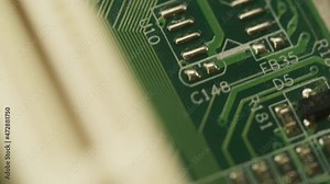 Microchip close-up, computer processor, motherboard. microcircuit details macro shooting. Repair service and technology concept.