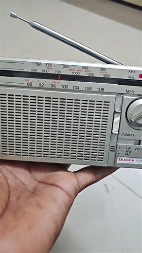vintage Dixons R390 portable transistor radio, likely from around 1980. made in Hong Kong 9023321435