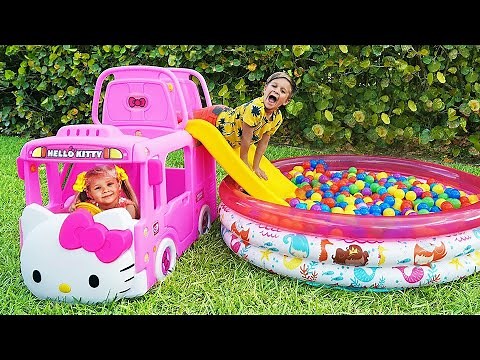 Diana and Roma play with New Toy Bus