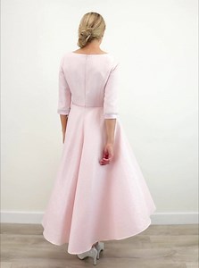 6.5K views · 43 reactions | Diamante embellished buttons add an extra touch of glamour to this beautiful pink dress from Giorgia Jo. Size 10 & 14 available with 20% OFF View more >> https://tinyurl.com/y7m5kazb Crafted from embossed fabric with a metallic shimmer throughout. Styled with a fitted cropped sleeve bodice and flared midi length skirt that is slightly longer at the back perfect for exciting Special occasions to come. | McElhinneys | Facebook