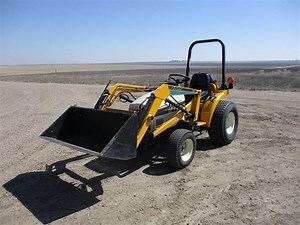 Cub Cadet 7195 MFWD Tractor W/Loader, Blade & Mower Deck | Agriculture