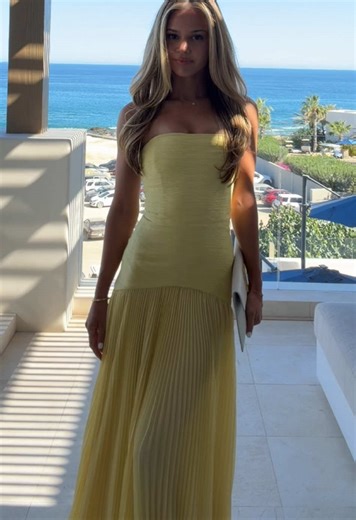 Clean strapless bodice pleated maxi sweep 💛✨ Soft luxury for every special occasion 🌸👑#pleatmaxigown #straplessgown #yellowgown #weddingguest #softluxury
