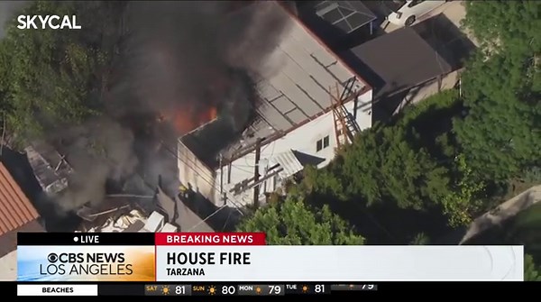 Los Angeles firefighters knockdown flames from burning Tarzana garage
