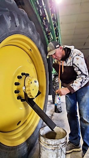 3.2M views · 55K reactions | Maintenance on the farm is never ending. The John Deere sprayer requires the oil in the wheel motors to be changed every 250 hours so it gets done a few times a year on our farm. The new bags that the oil comes in are pretty handy. #johndeere #farm #farmlife #oil #amputee #maintenance #equipment | 1HandnFarming | Facebook