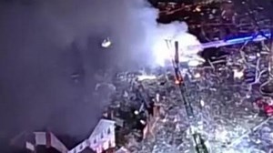 The blast and fire occurred while firefighters were inside the building